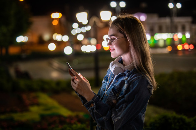 Young Woman Reading SMS