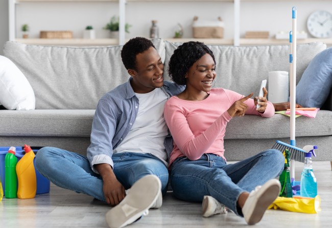 Black Couple Using Cleaning App