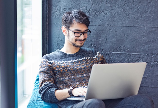 Man Watching Engaging Videos