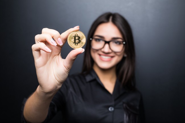 Women Holding Bitcoin
