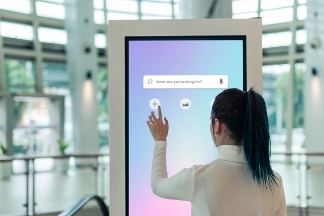 Women Using Digital Signage